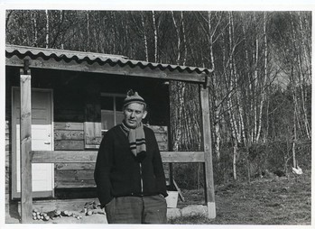 Jan Křížek in front of his house in Le Bartheil